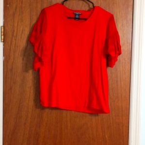 Red top with flowy sleeves